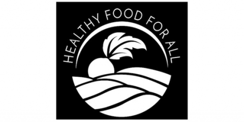 Healthy Food For All Logo- A giant beet sits on hilly farm land